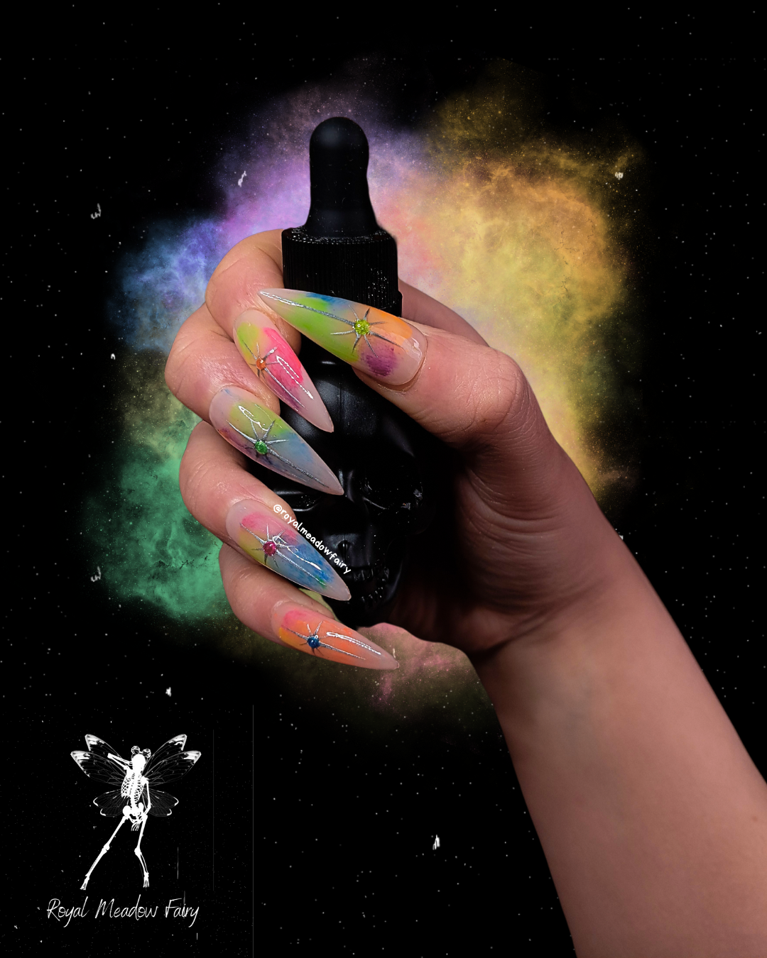 best uk press on nails with silver stars and a rainbow splash background