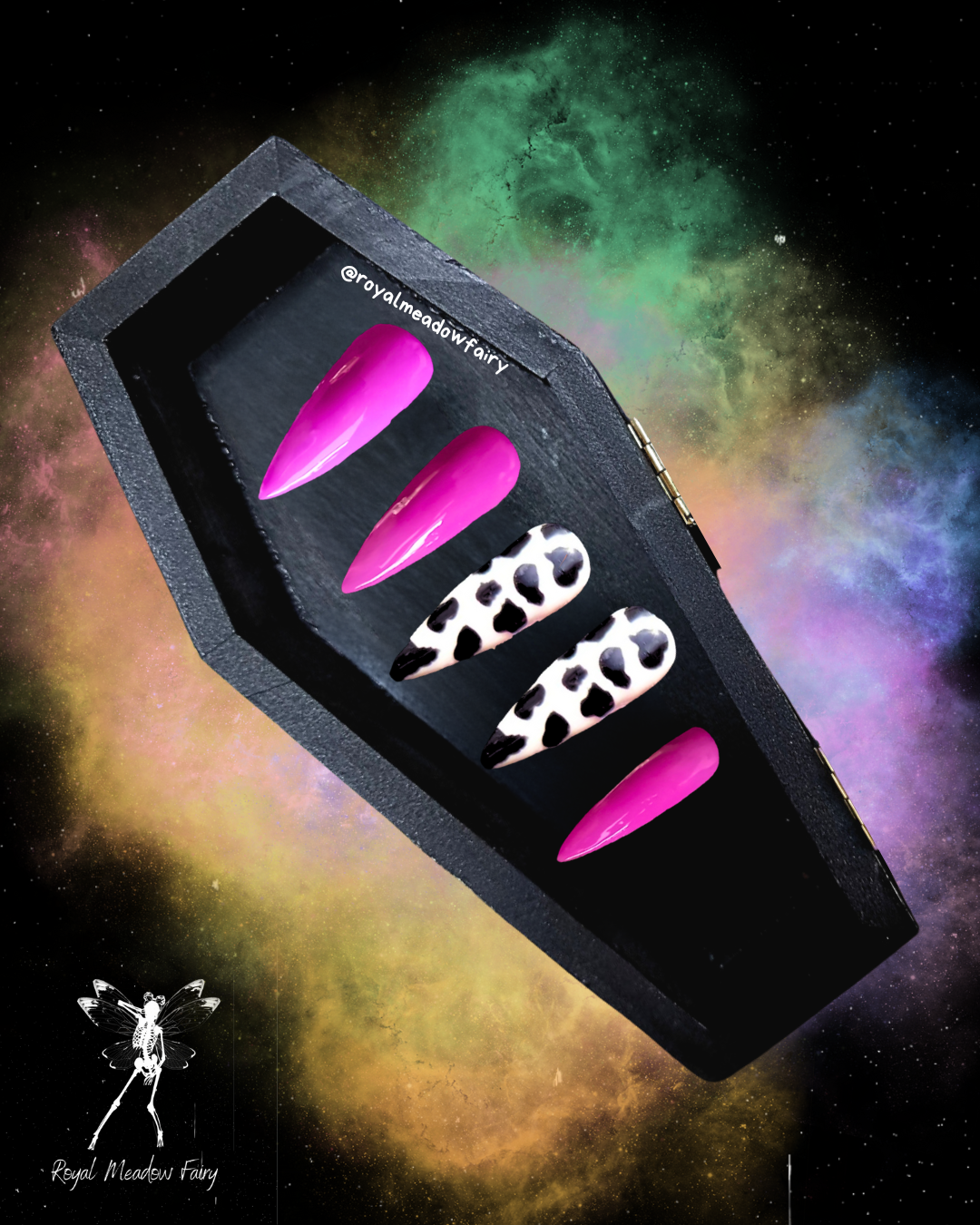 hot pink glue on false nail enhancements with double accent nails of black and white cow print nail art design