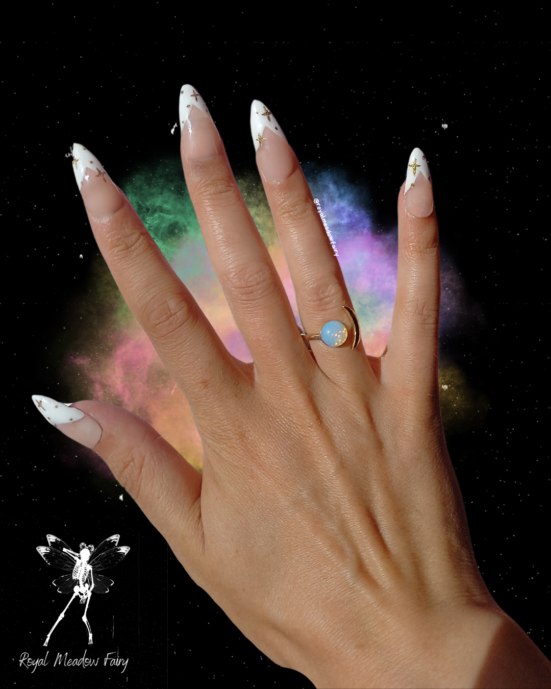 pink and white stick on french nail extensions with gold start nail art accent