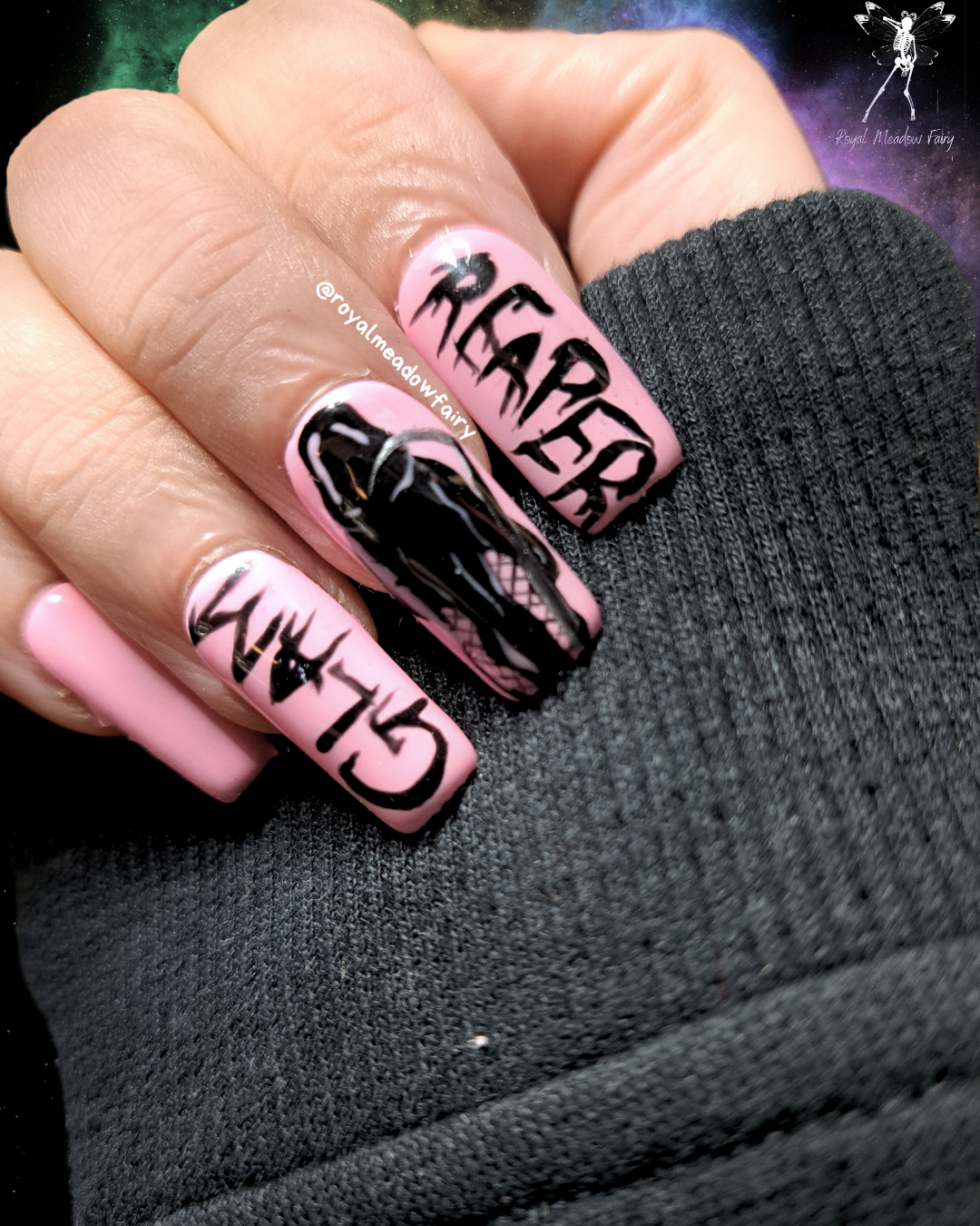 baby pink press on nail extensions with glamorous glamour grim reaper in fishnets nail art and gothic heavy metal writing