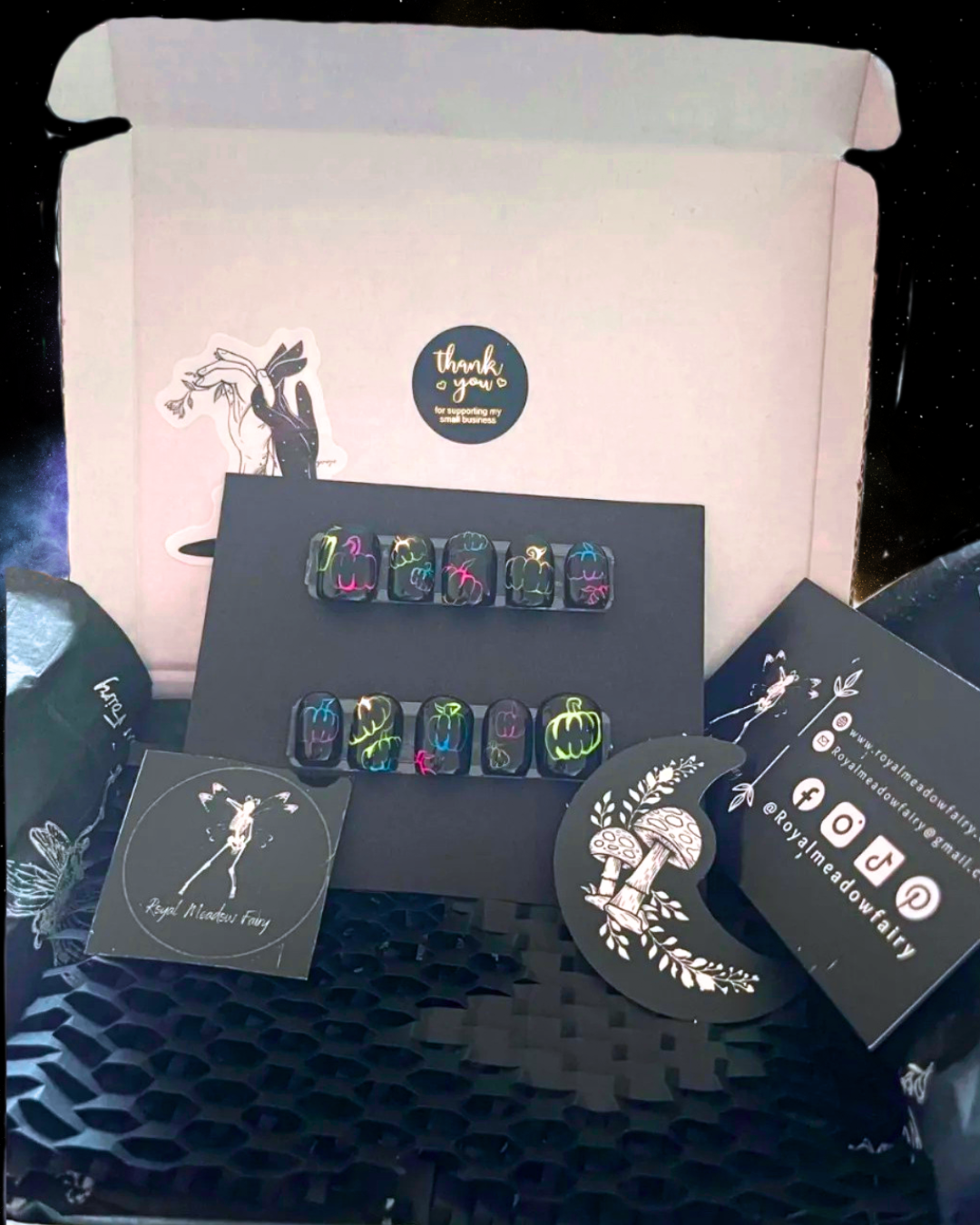 short square black press on nails with neon Halloween pumpkins hand painted nail art design