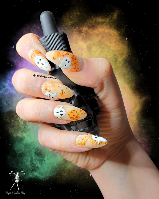 halloween glitter orange glue on fake nails with ghost nail art design