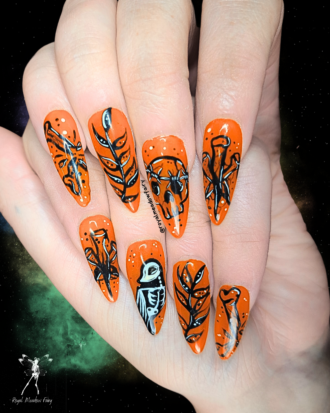 Orange alt gothic press on nails with tattoo style nail art design