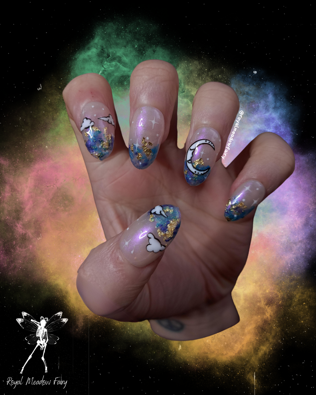 shimmer sky press on nails best in the uk with gold leaf accent and moon and clouds nail art design