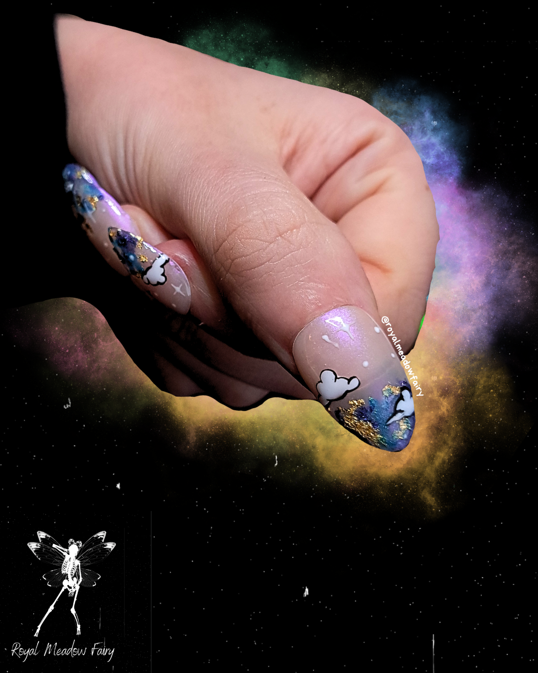 shimmer press on nails with sky and clouds nail art and gold leaf accent