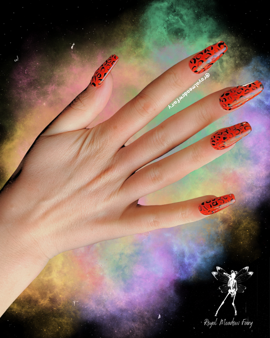bright red press on fake nail enhancements with black leopard print nail art medium gloss coffin