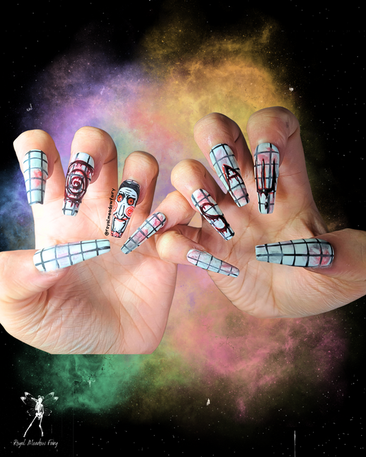 saw the halloween scary movie stick on nail extensions with real looking blood effects and the jigsaw puppet nail art on check tiles