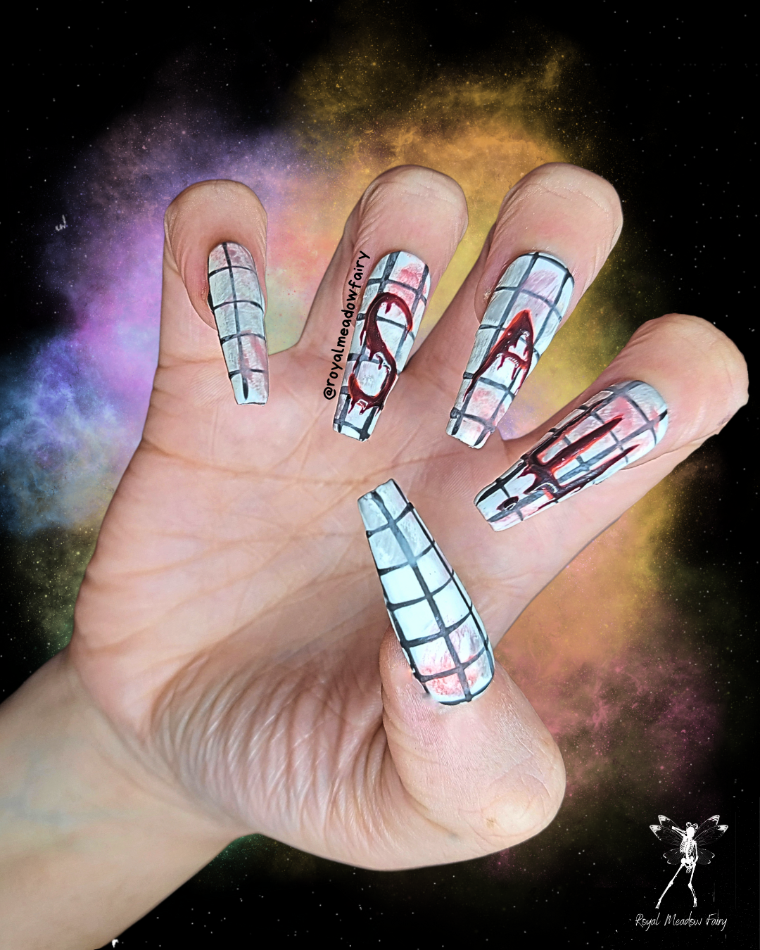 horror movie press on nail enhancements saw with jigsaw pupper and realistic blood on check tiles nail art design