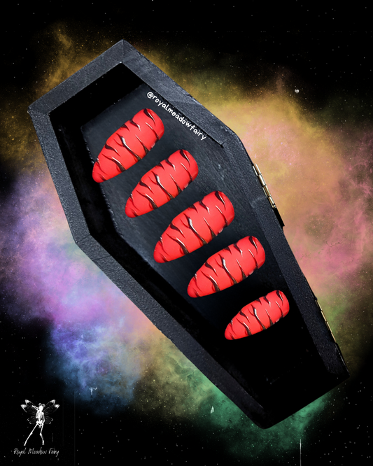 bright red matte stick-on nail extension with gloss black tiger print stripes nail art