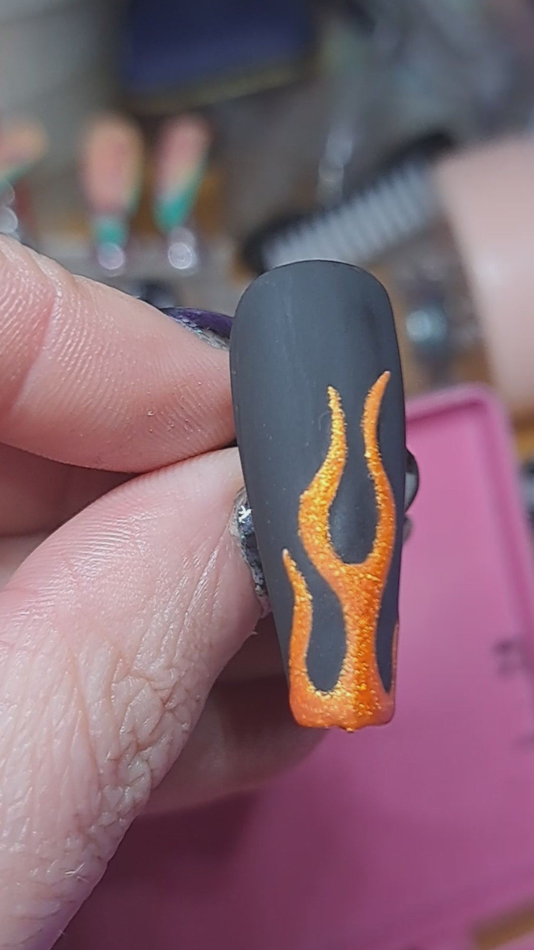 orange glitter flame nail art on black matte press on nails
