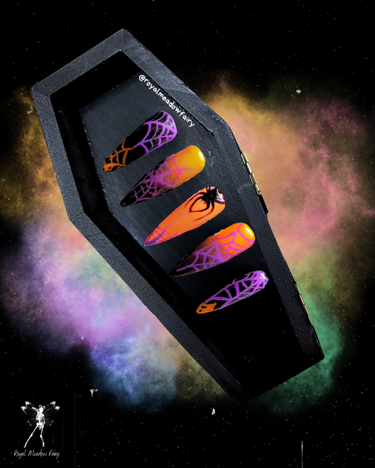 orange and black ombre press on nail extensions with purple black and orange spider and web nail art halloween