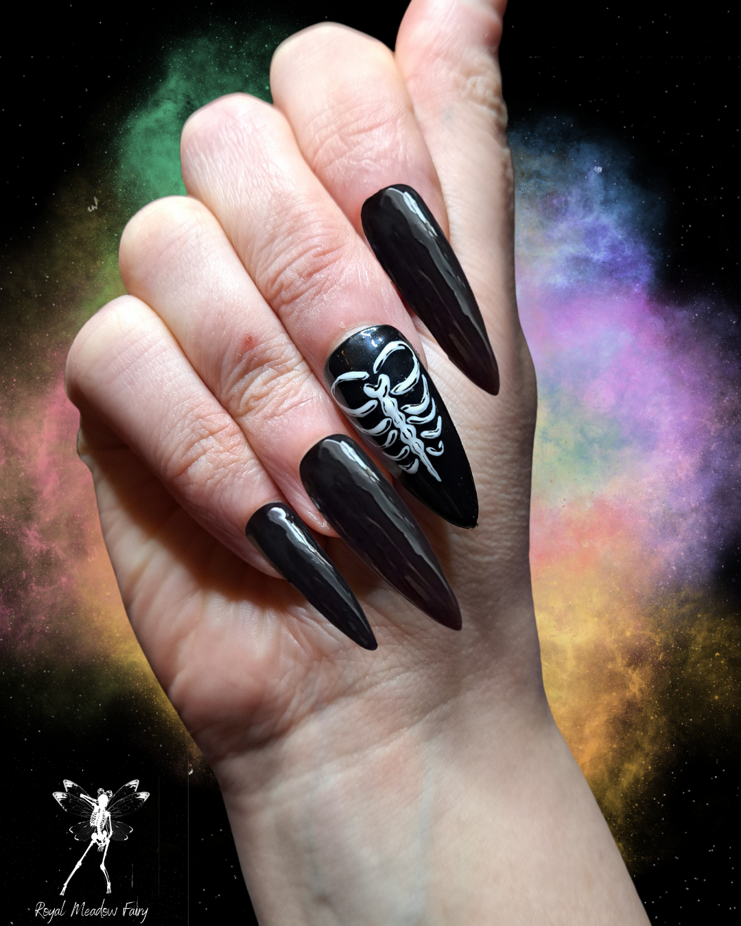 plain black valentines press on nails with a gothic ribcage heart nail art design 