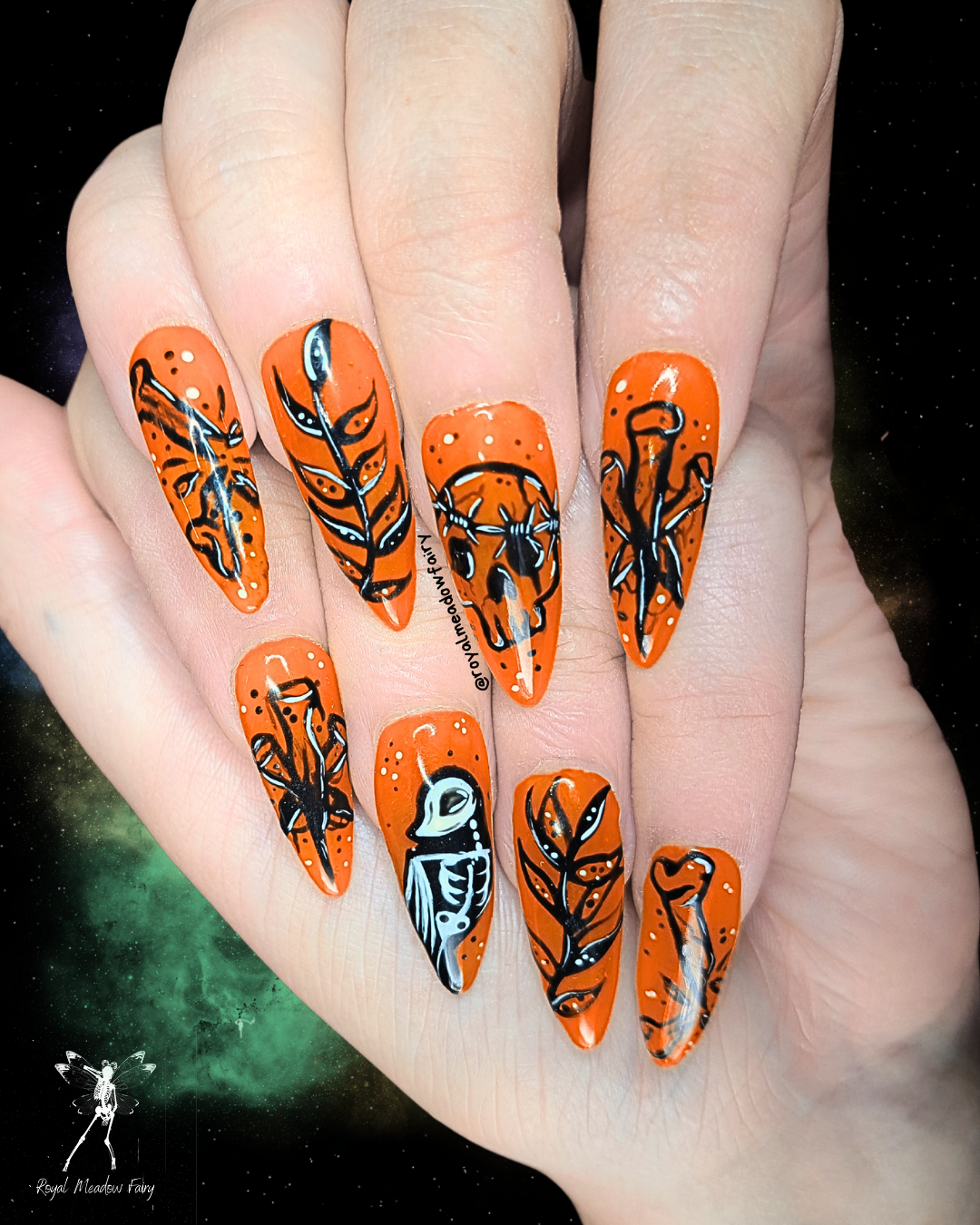 Orange alt gothic press on nails with tattoo style nail art design 