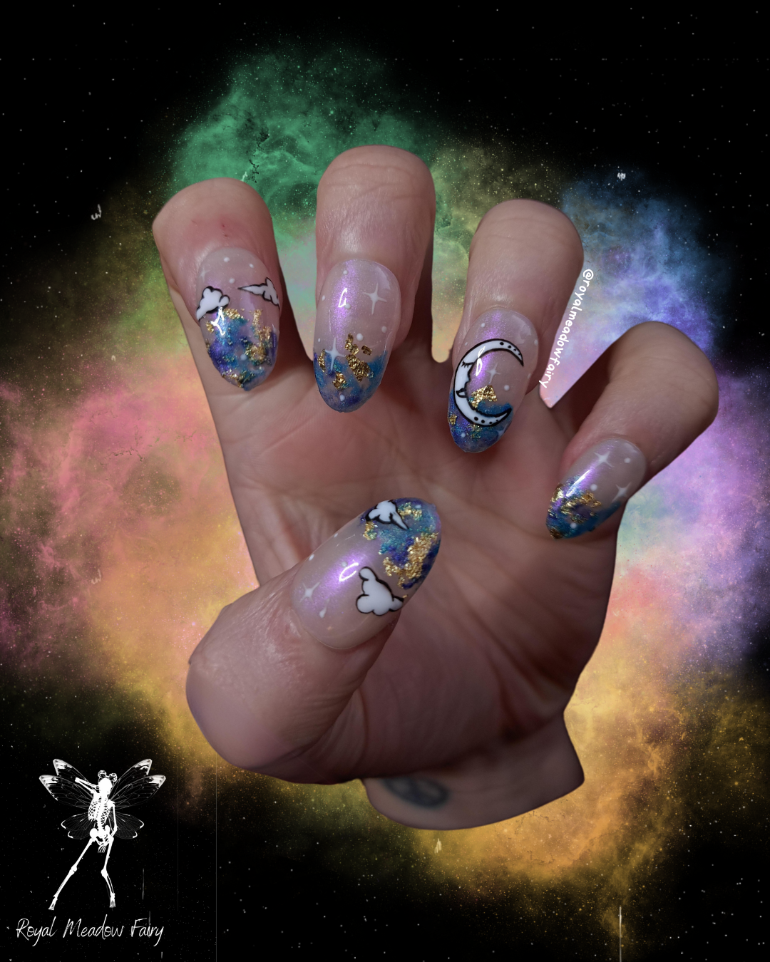 shimmer sky press on nails best in the uk with gold leaf accent and moon and clouds nail art design 