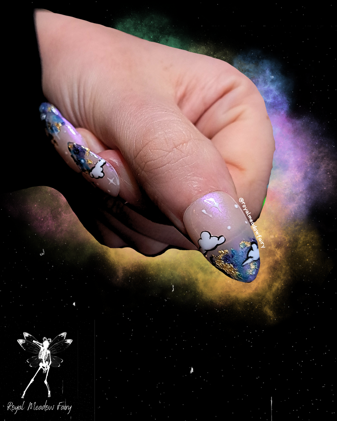 shimmer press on nails with sky and clouds nail art and gold leaf accent 