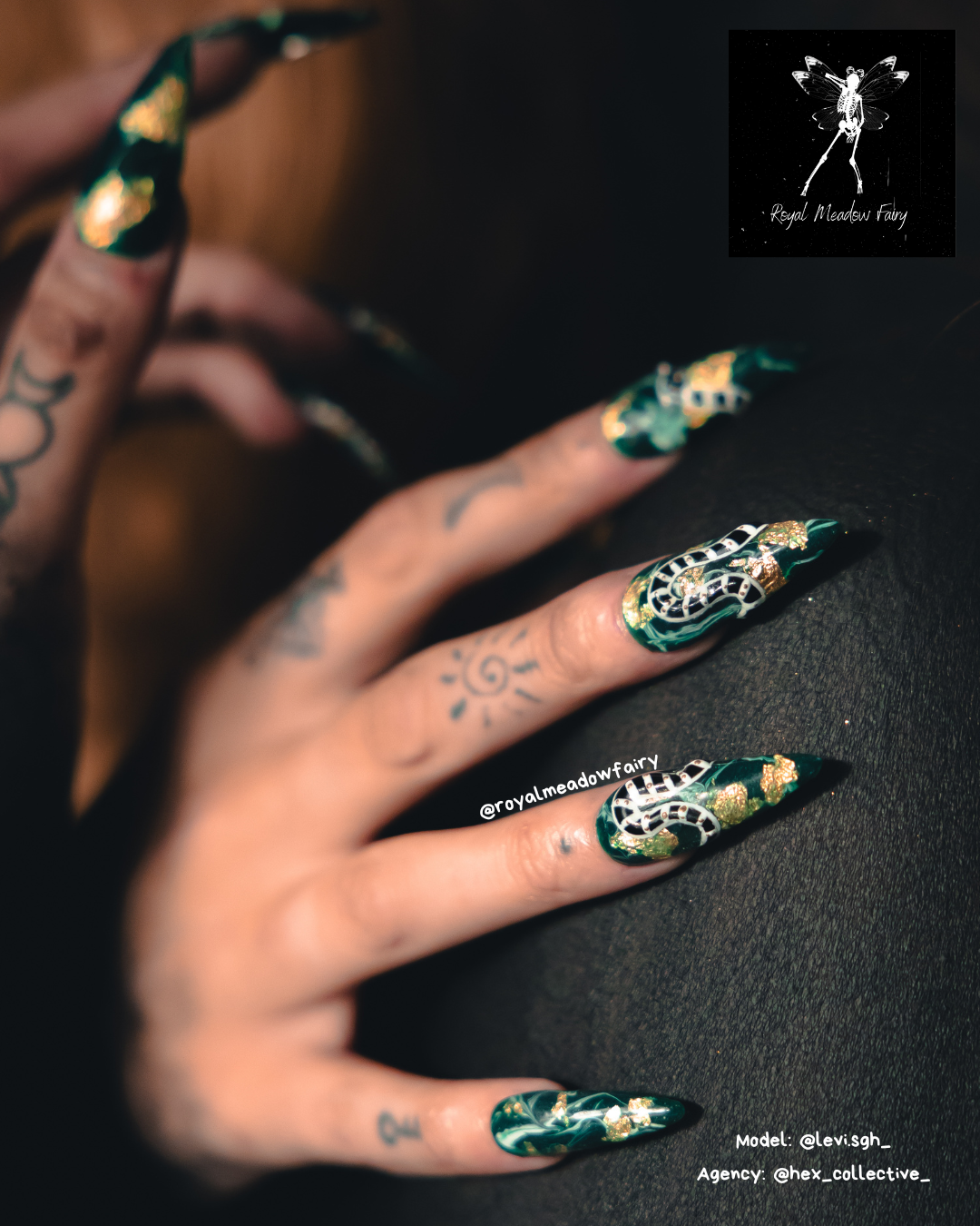 strong uk press on nails green marble with gold leaf accents and serpent nail art design 