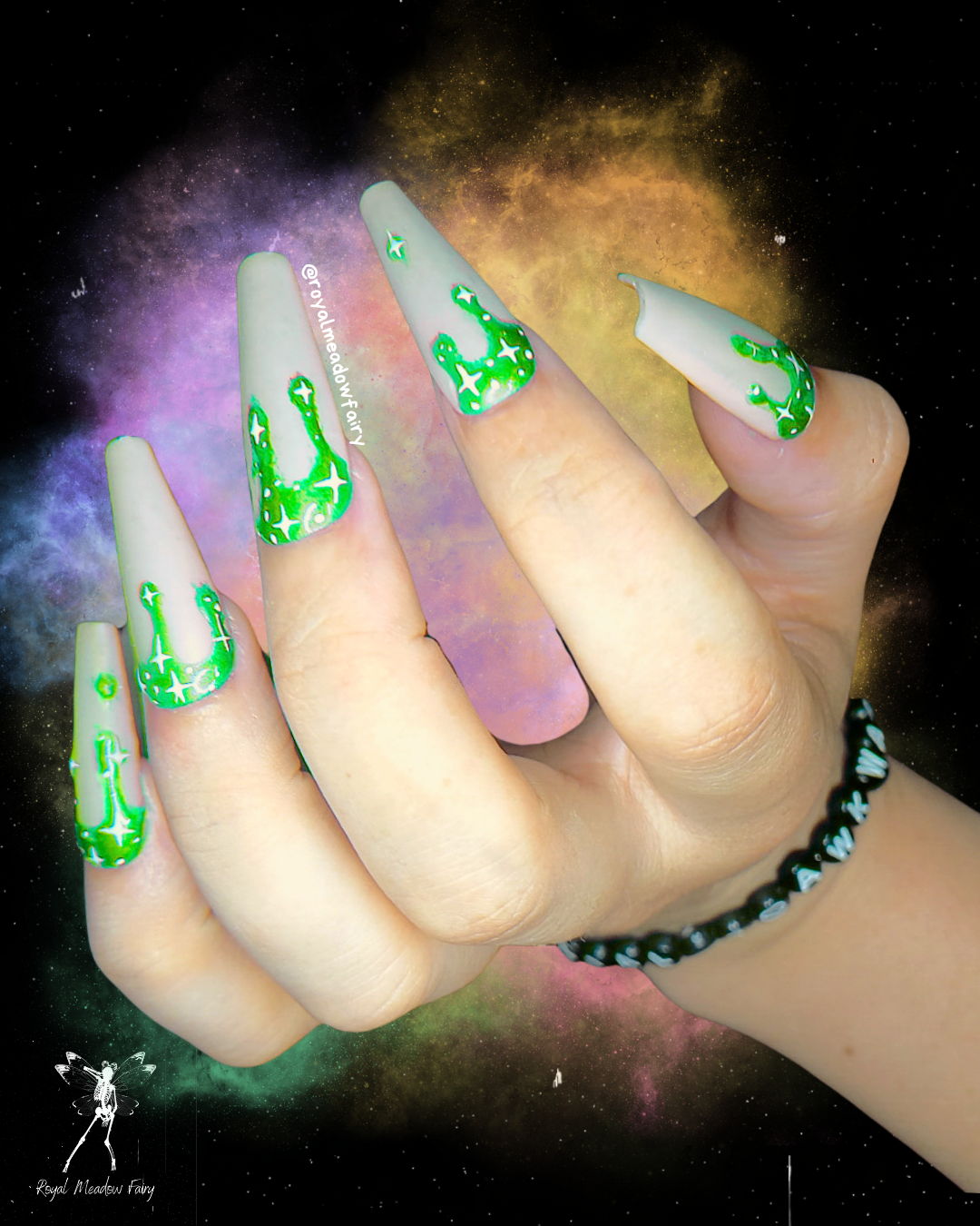 milky white press on nails with lime green drips and stars 