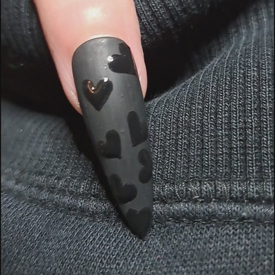 matte black nail with gloss black valentines heart nail art design 