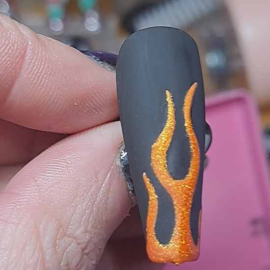 orange glitter flame nail art on black matte press on nails 